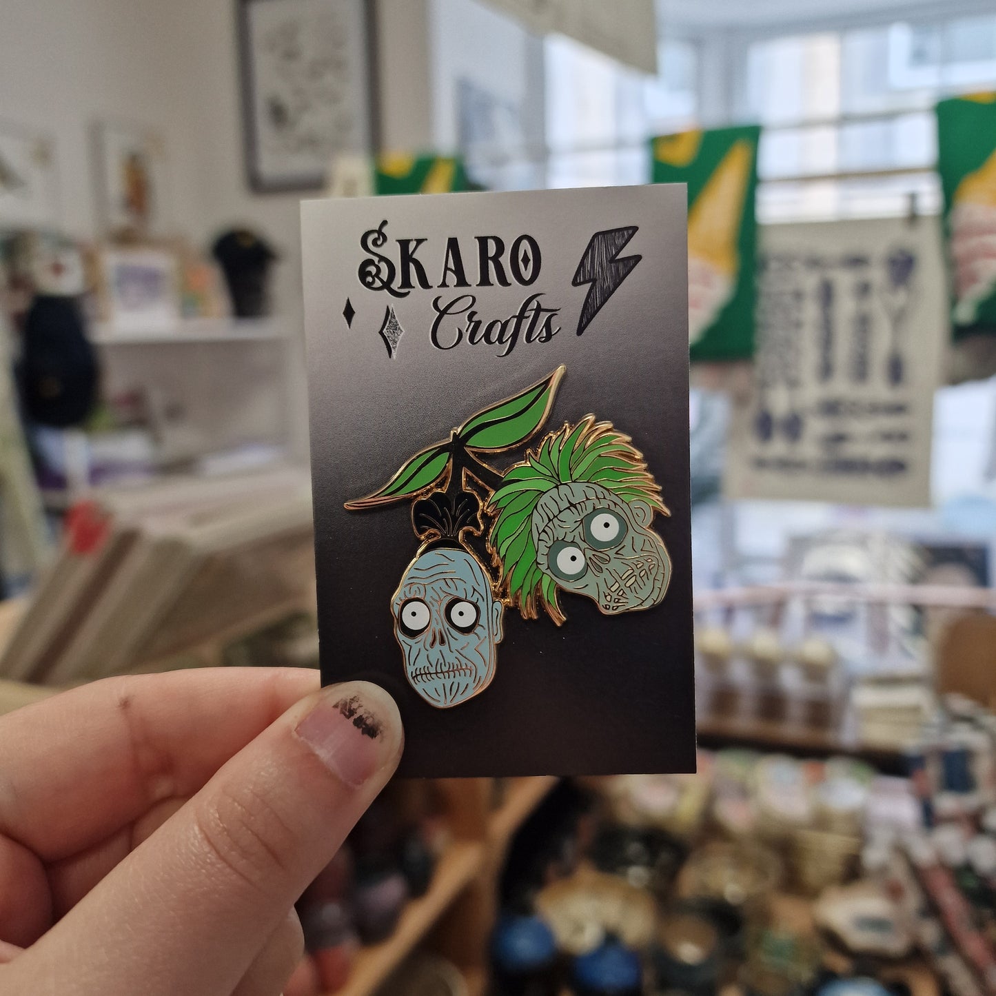 Shrunken Head Cherries Enamel Pin